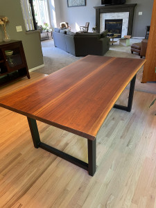 Rich walnut live edge dining table               